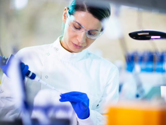 Scientist using a pipette