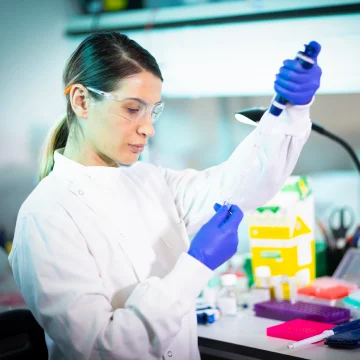 Scientist with pipette